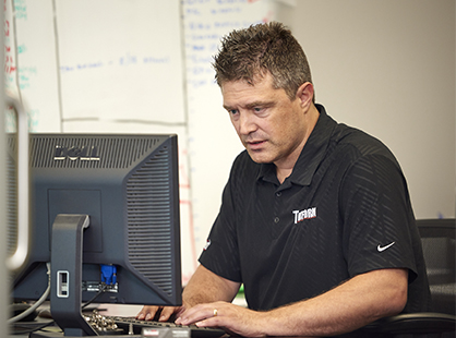 man working on a computer